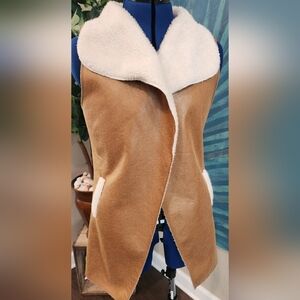 E2 Clothing tan shurpa long vest. Faux fur $15